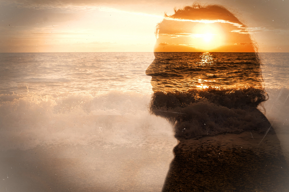 Portrait of bearded male background seaand sunrise. Concept innerbeing subconscious. Stylization old photo.